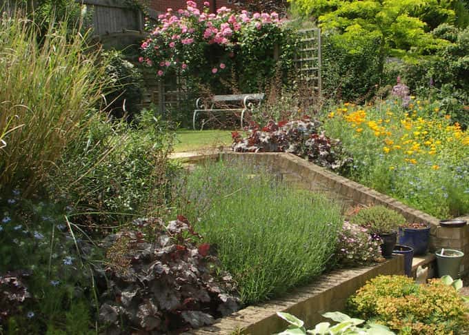 Exuberant planting helps create privacy in an overlooked garden