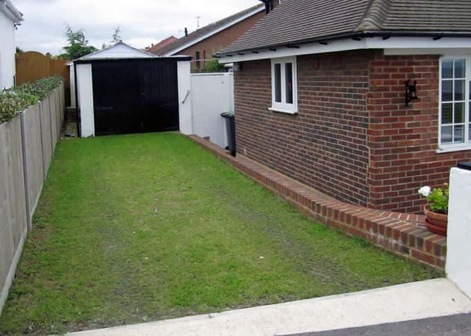 The established grass on the regularly used driveway