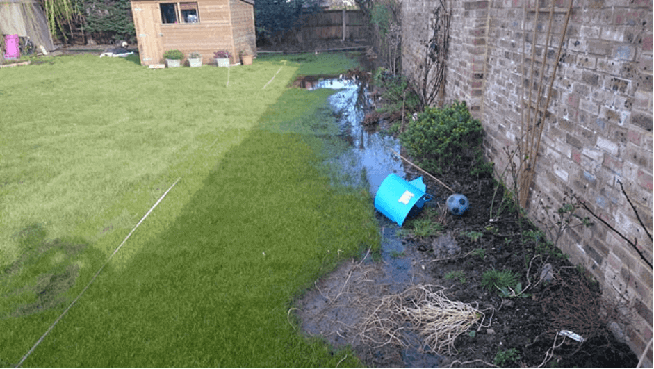 waterlogged garden in need of a drainage solution