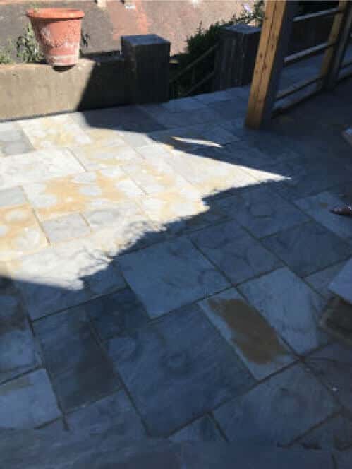 Image of paving discolouration due to acid cleaners