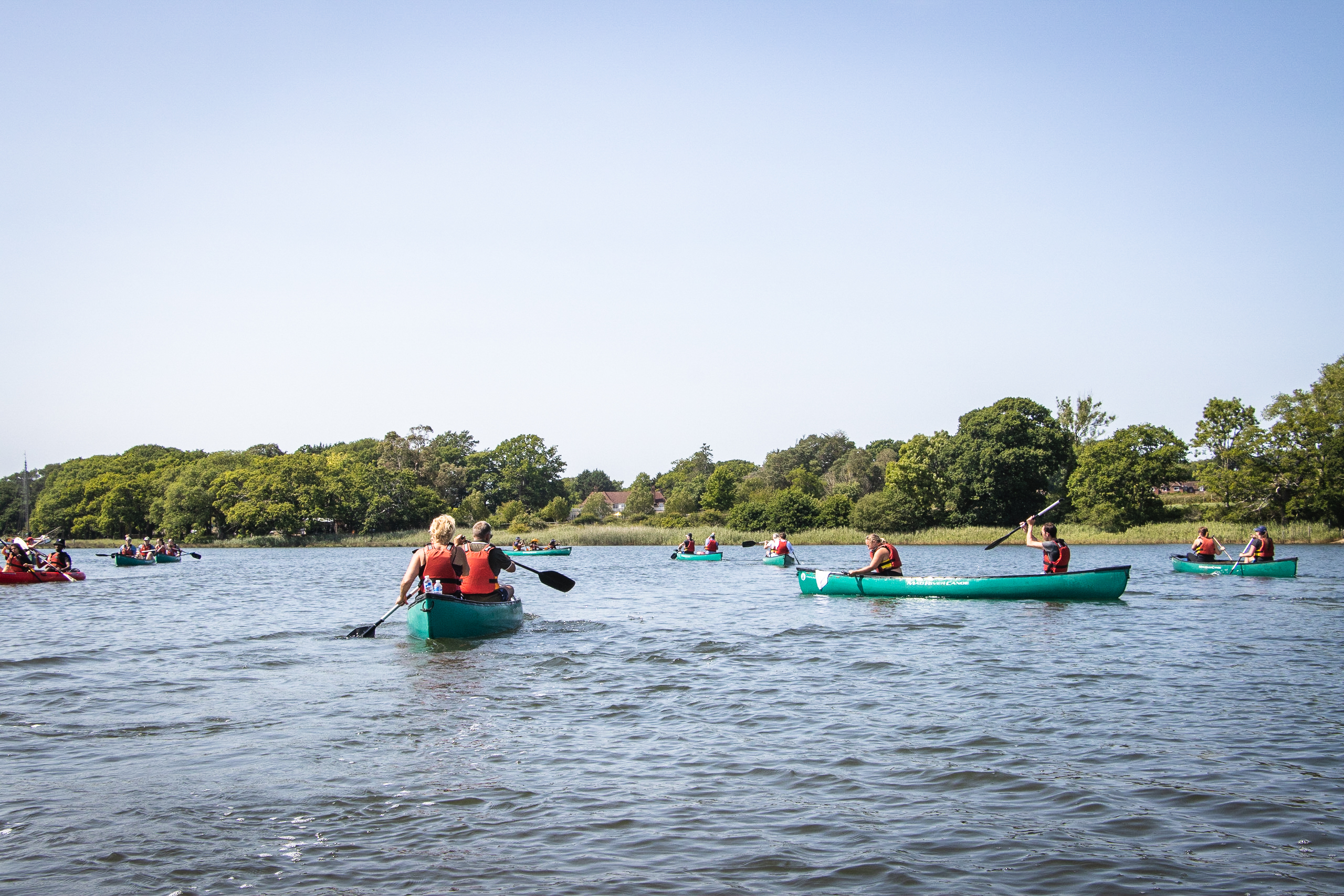 A group of canoes on the water