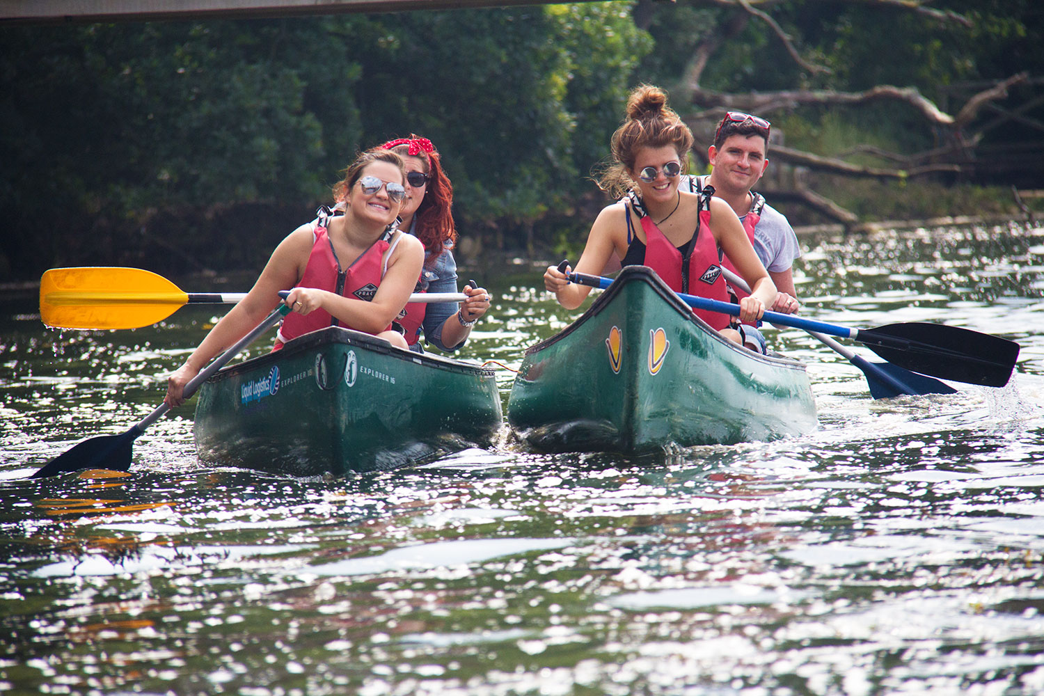 A group enjoying private activities, canoeing on the Beaulieu River A group enjoying private activities, canoeing on the Beaulieu River