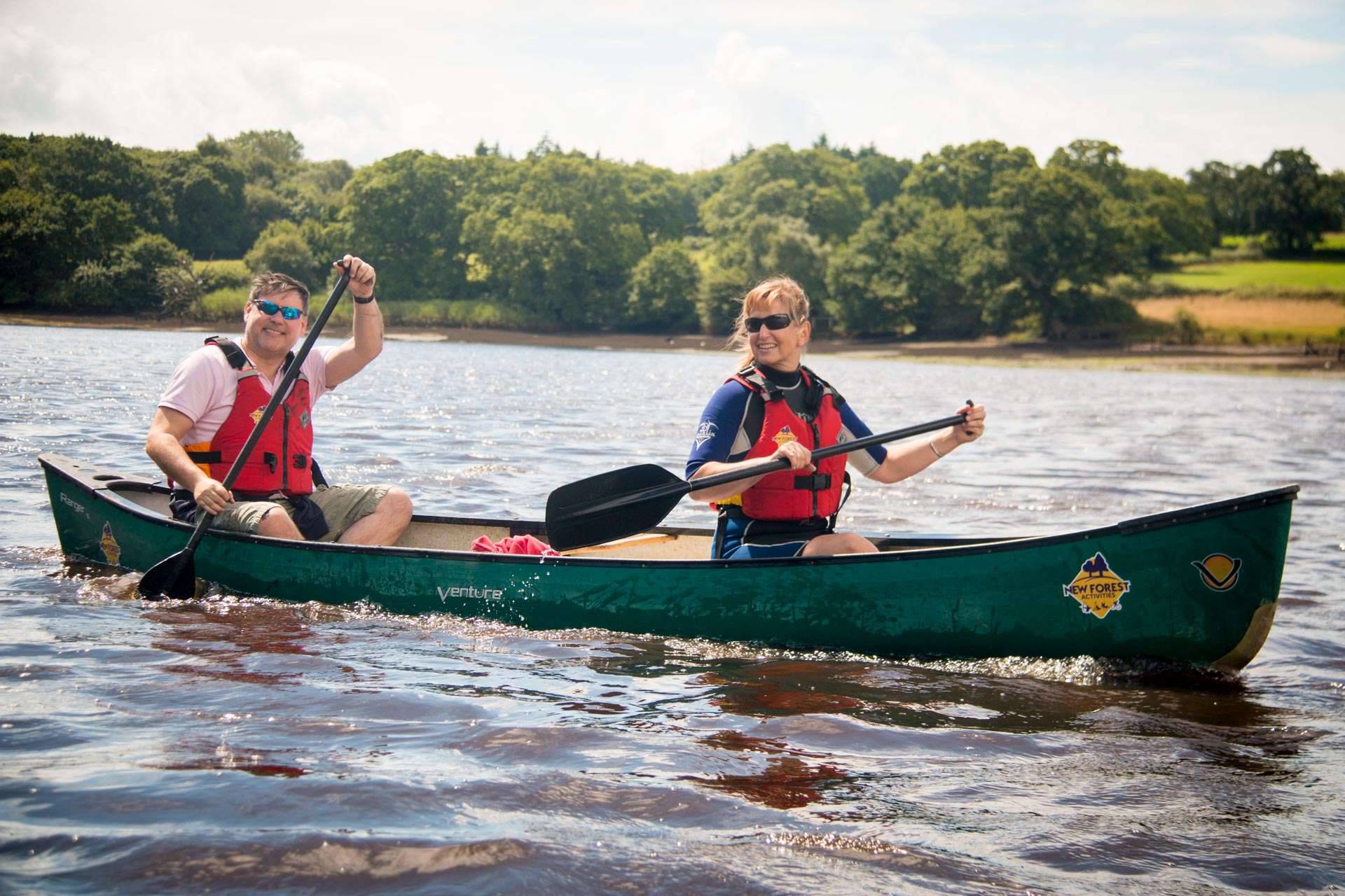 A couple enjoying their Beaulieu River tour.