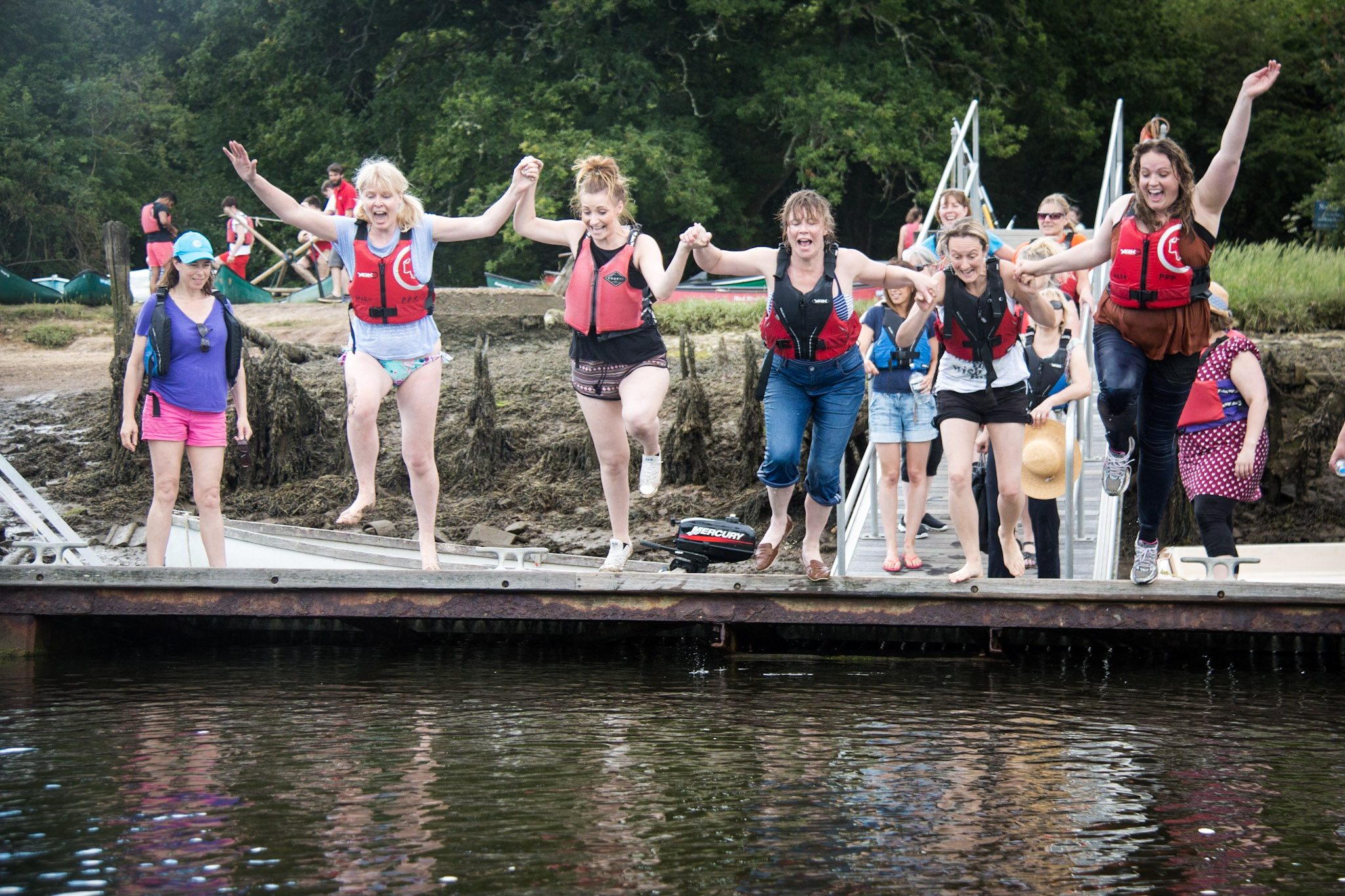 Hen party jumping into river 