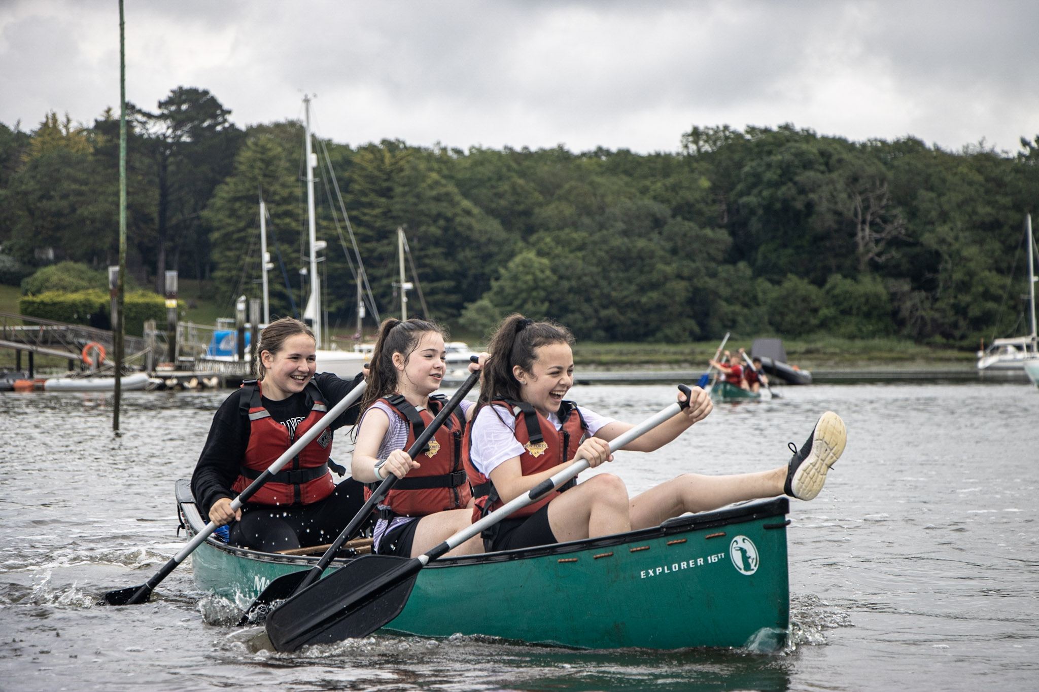 Youth activities include canoeing on the Beaulieu River.