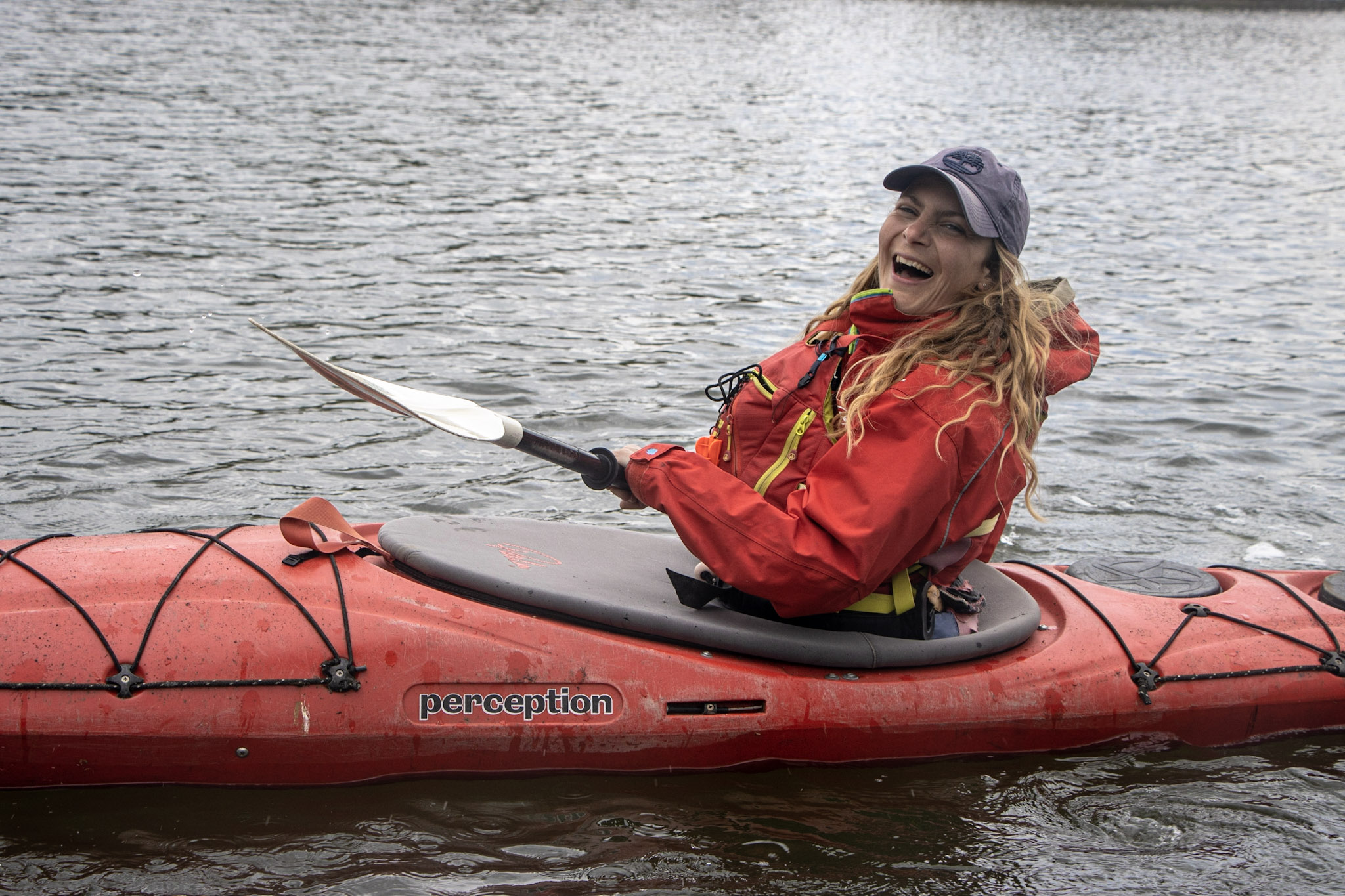 A lady learning to kayak and deliver kayaking sessions as part of an Outdoor Instructor Course