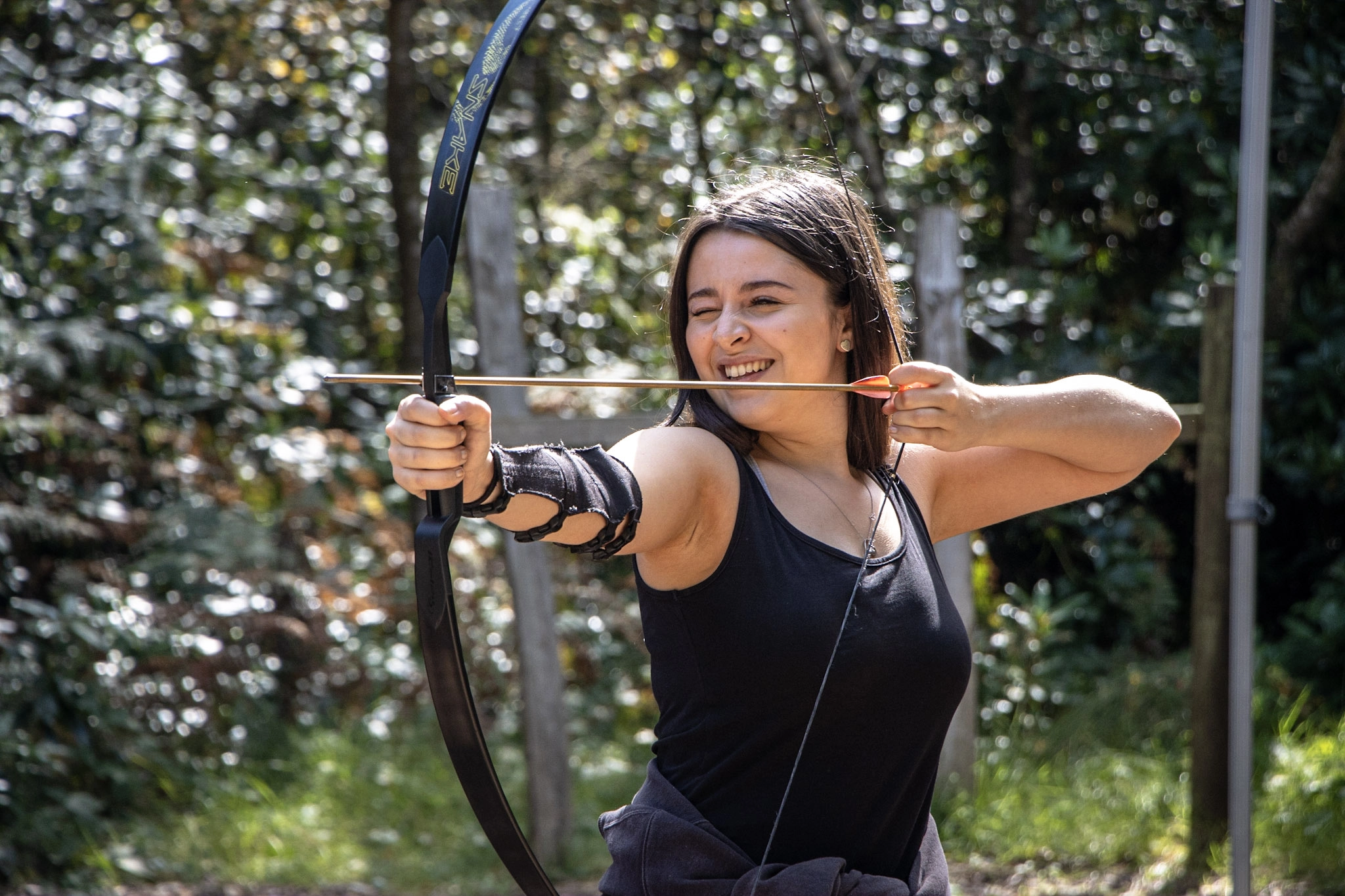 archery activities during a bespoke mobile team building event