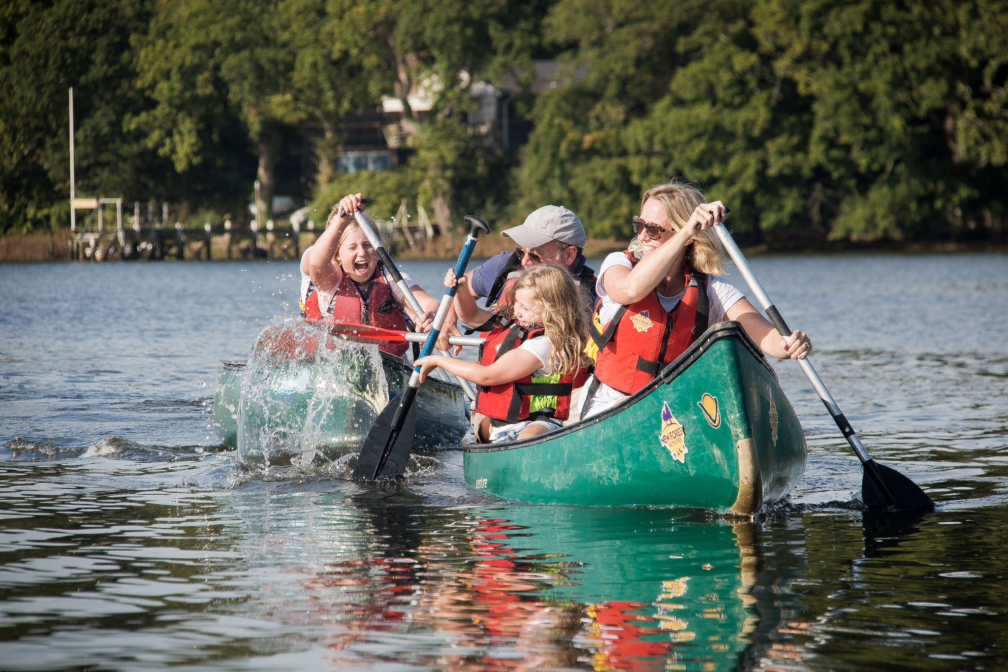 A family canoeing on the Beaulieu River