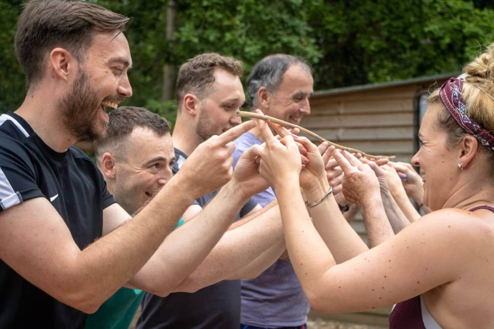 A group of colleagues doing activities in the new forest