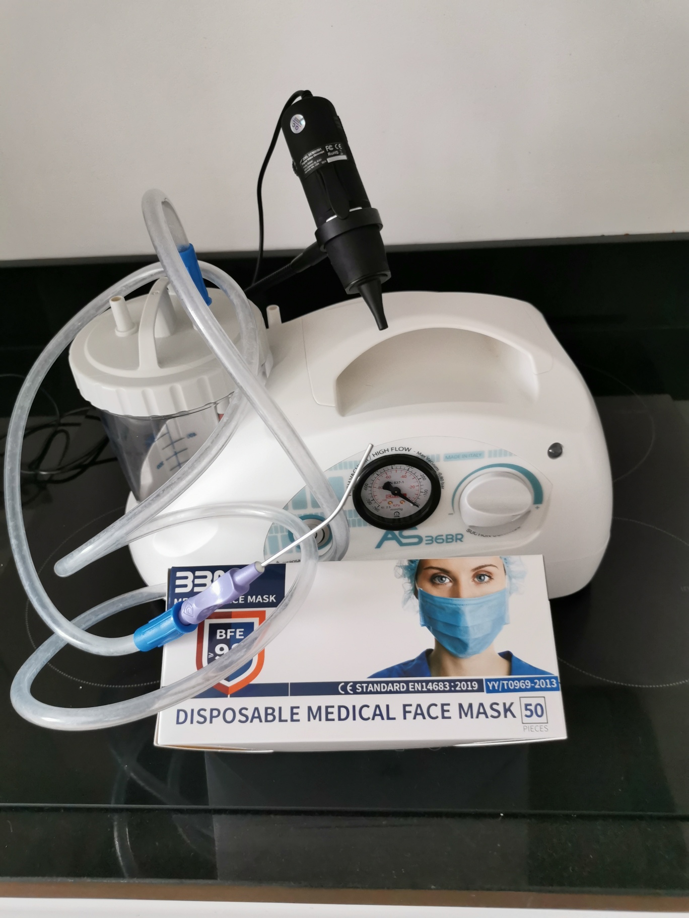 A Suction Machine and Otoscope