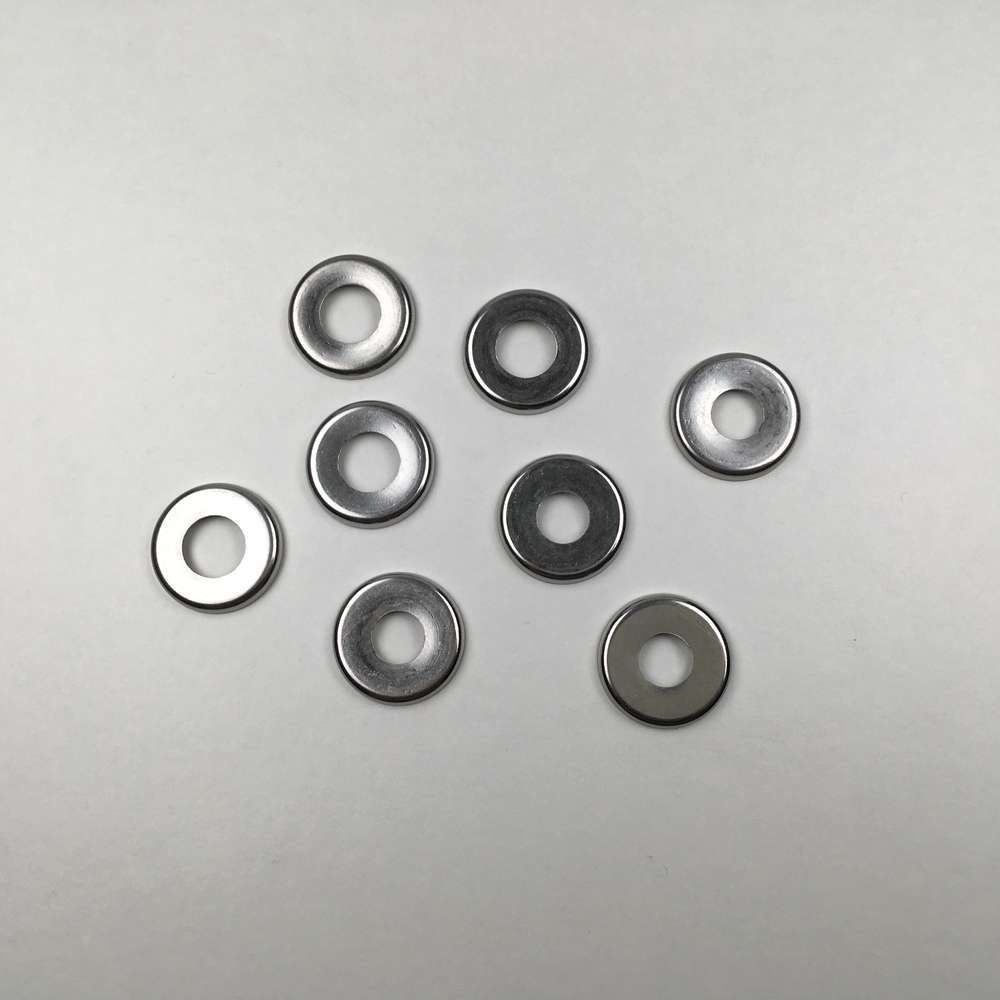 Rear suspension cup washers