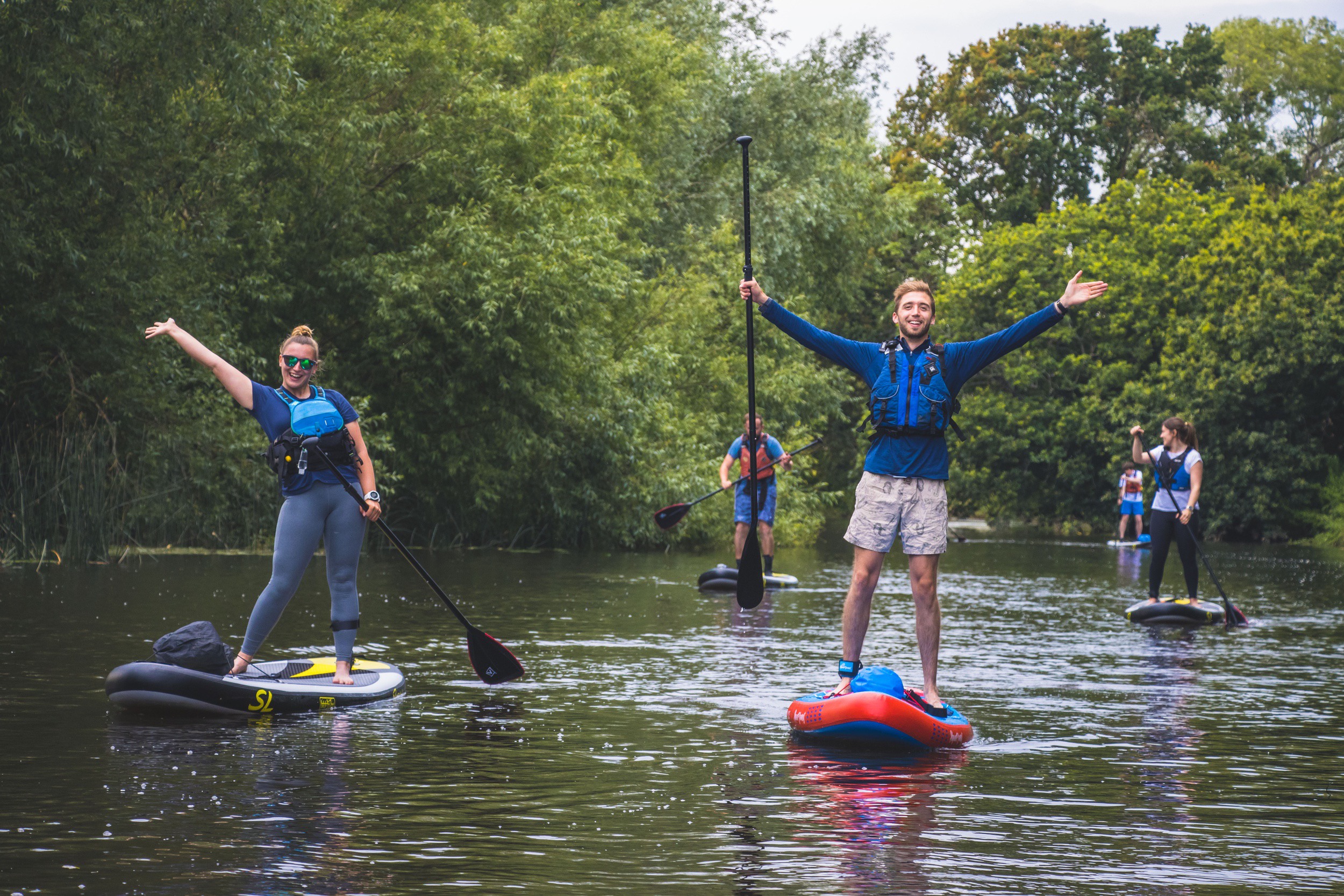 A family enjoying a family canoeing session with Cairngorm Activities