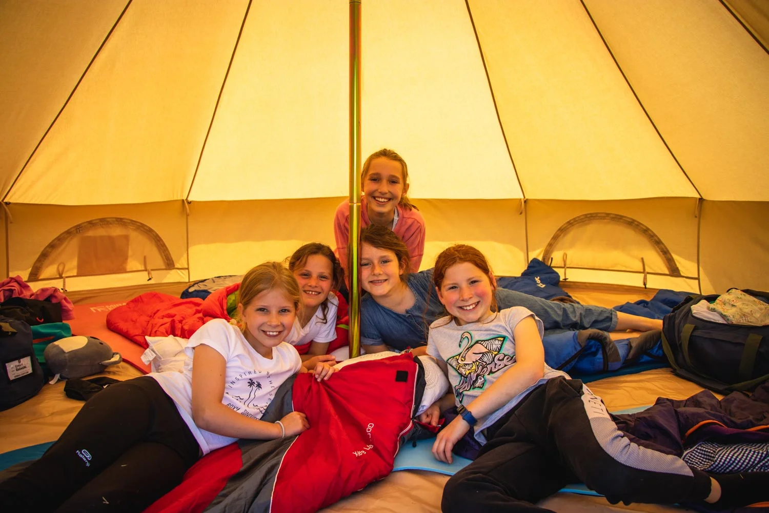 Bell tents set up for overflow accommodation during summer months