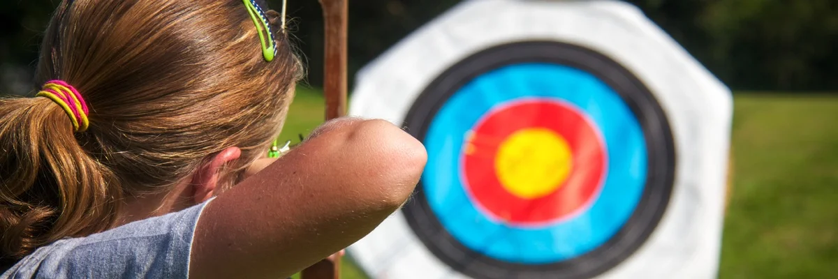 archery activities during a bespoke mobile team building event