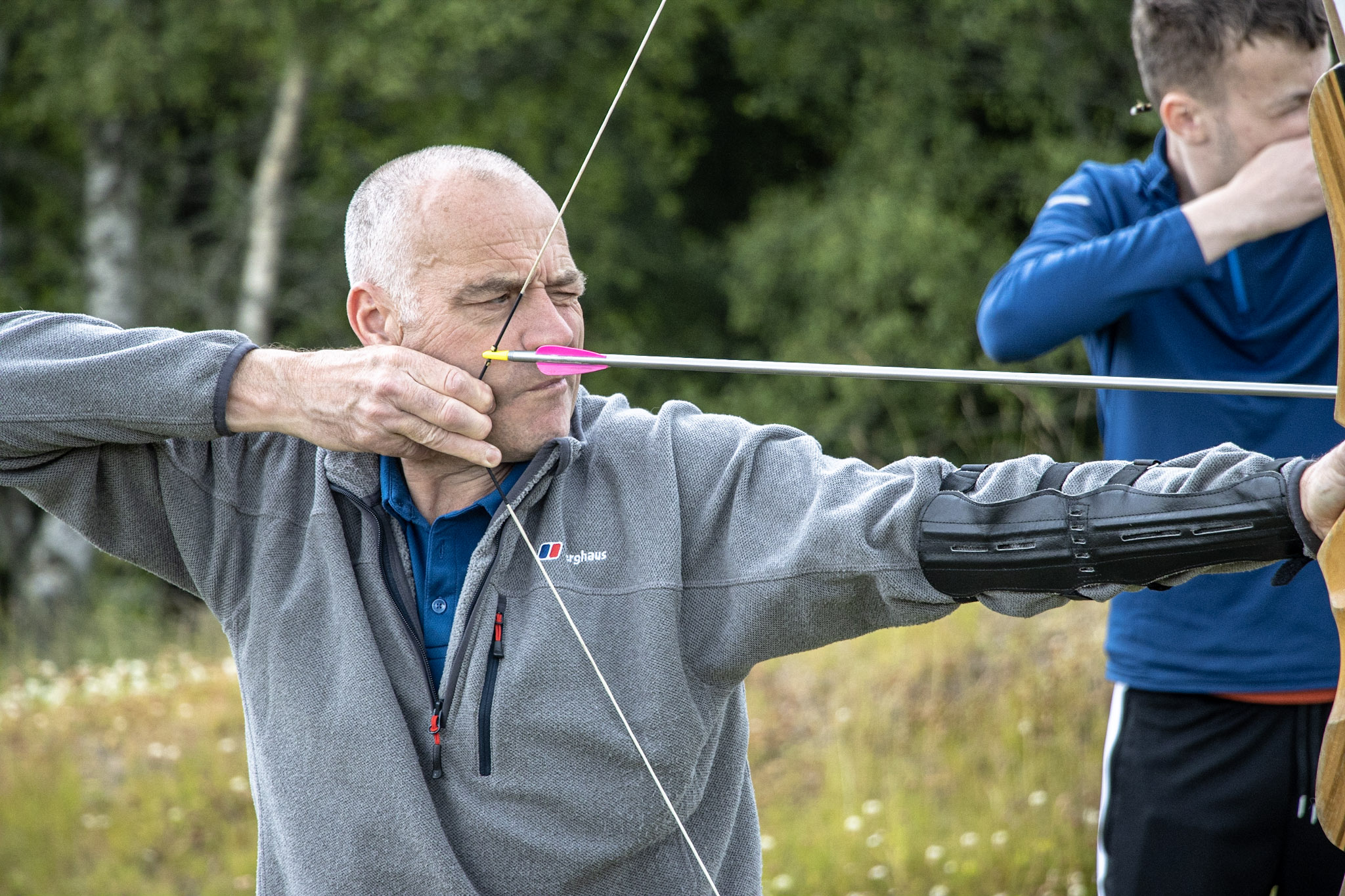 A girl shooting arrows during a Family Archery session