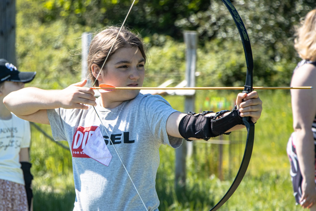 A girl enjoying an archery session