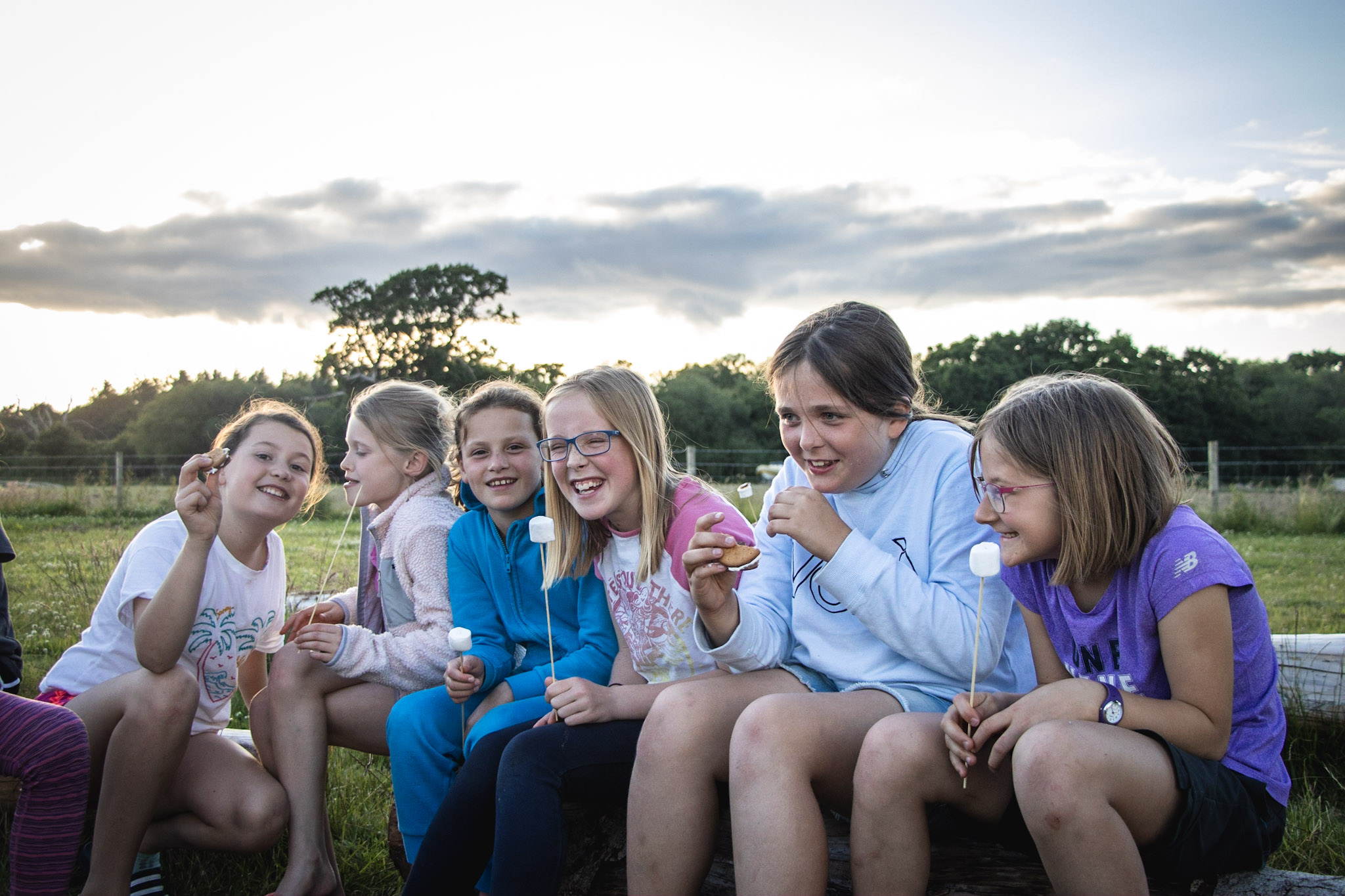 A group of children enjoying an outdoor party at Cairngorms Activities
