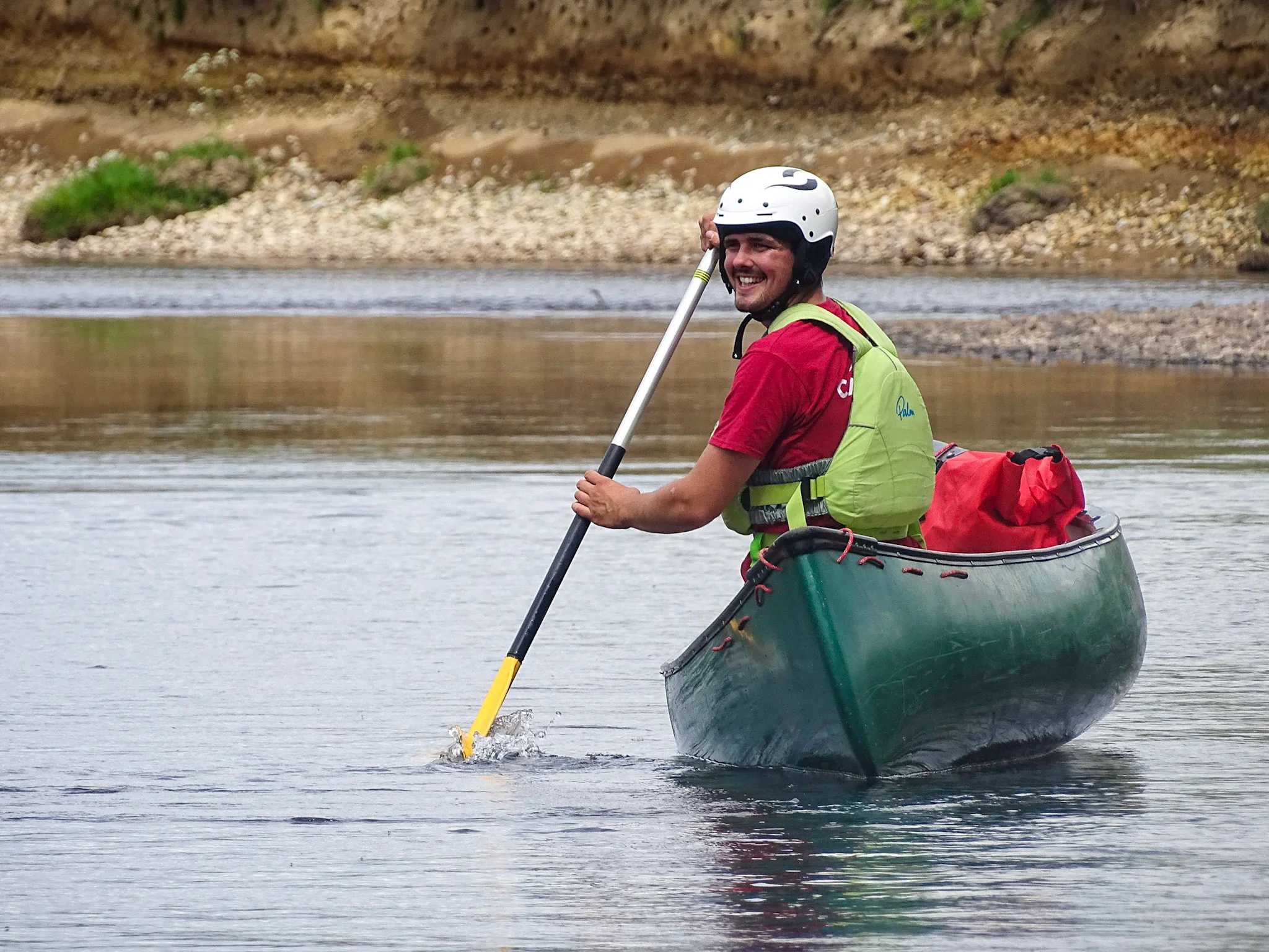 An Outdoor Instructor canoeing along the River Spey