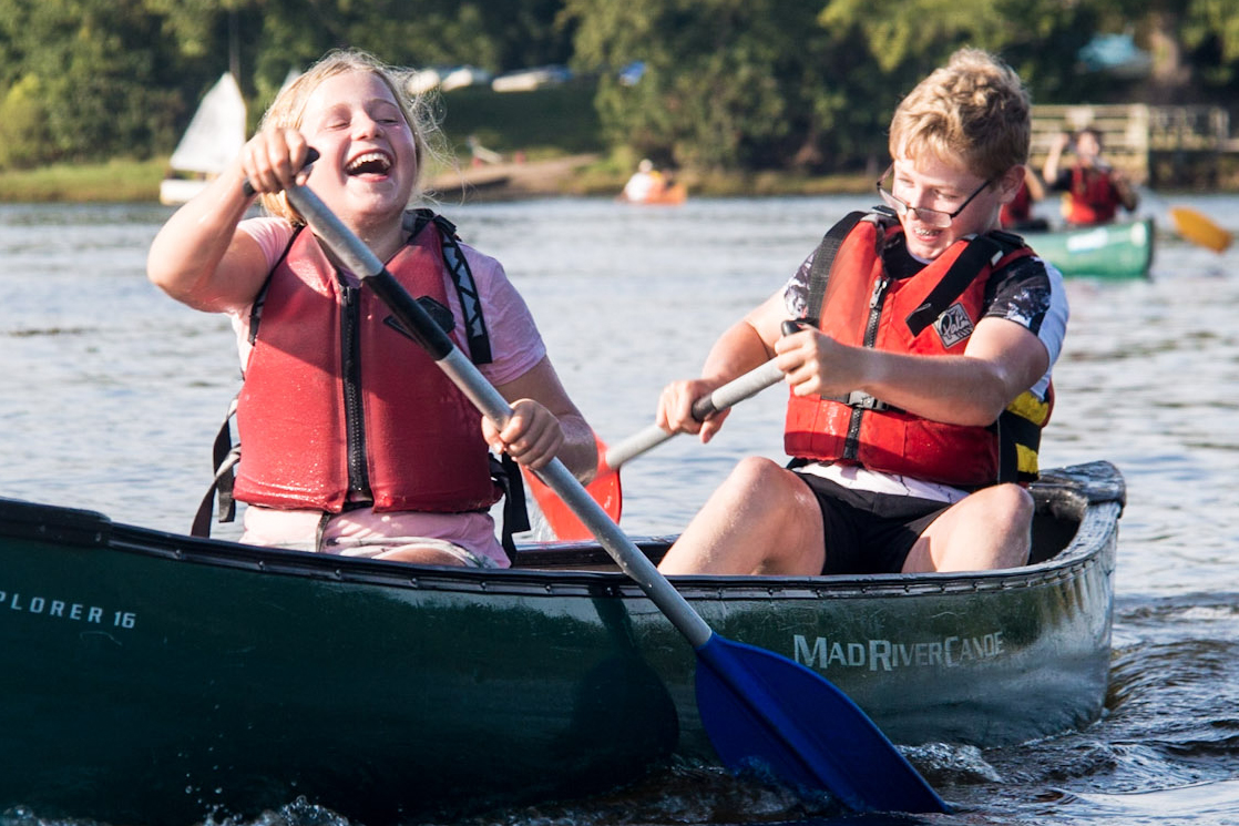 Adventure schol trips in Scotland include canoeing on the River Spey