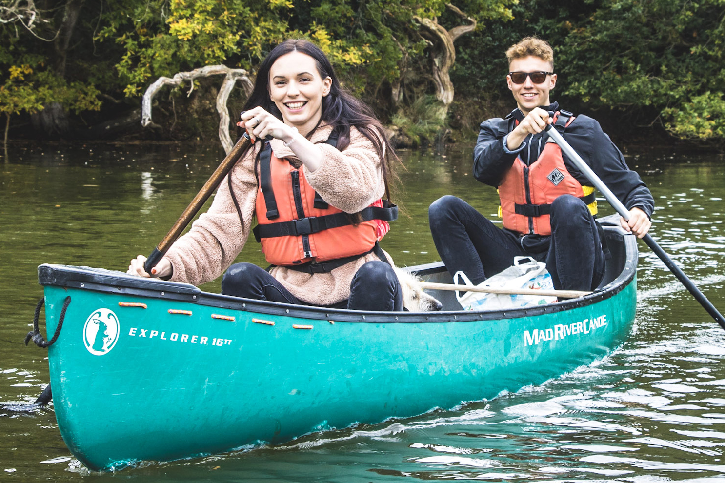 A family enjoying a canoeing session with Cairngorm Activities