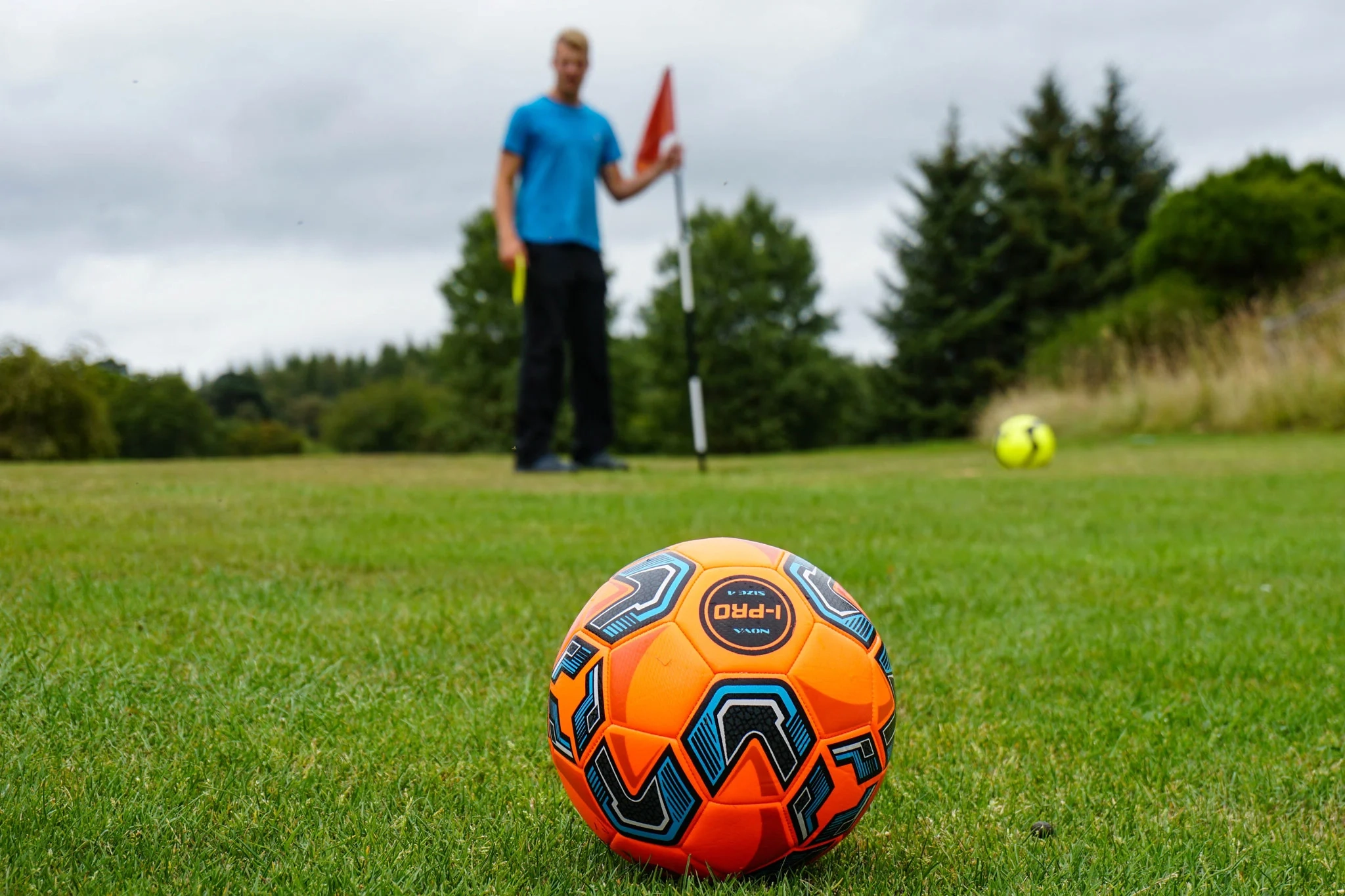 A boy taking part in golf during a family day out with Cairngorms Activities