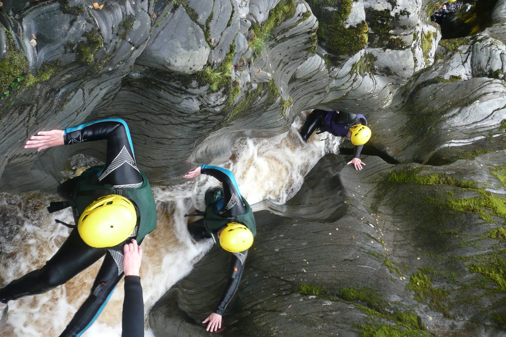 A group of mates gorge walking in the Cairngorms National Park