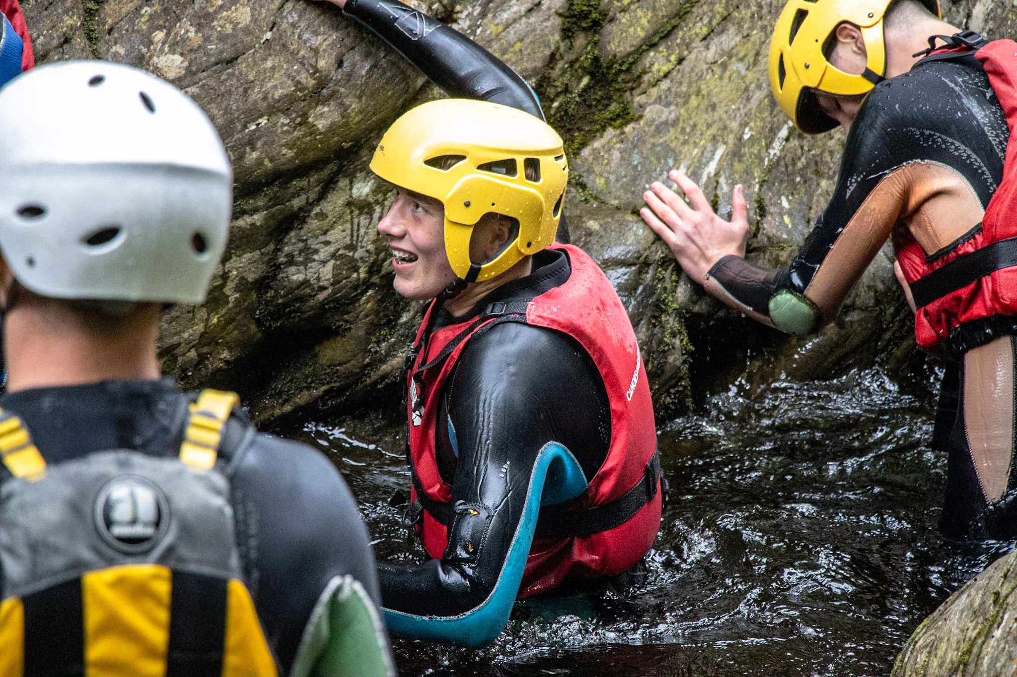 A stag party group taking part in Gorge Walking in Scotland