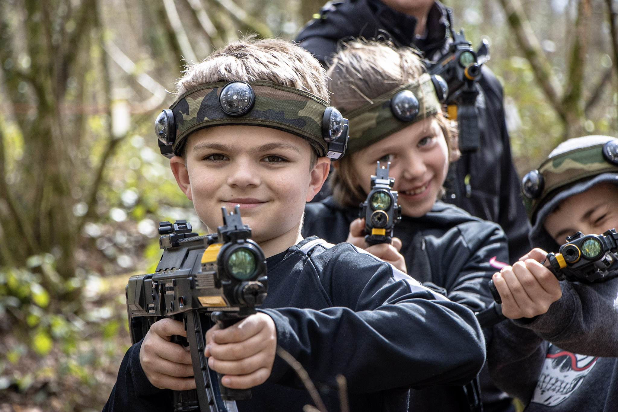 A group of friends playing the laser tag game, BattleZone