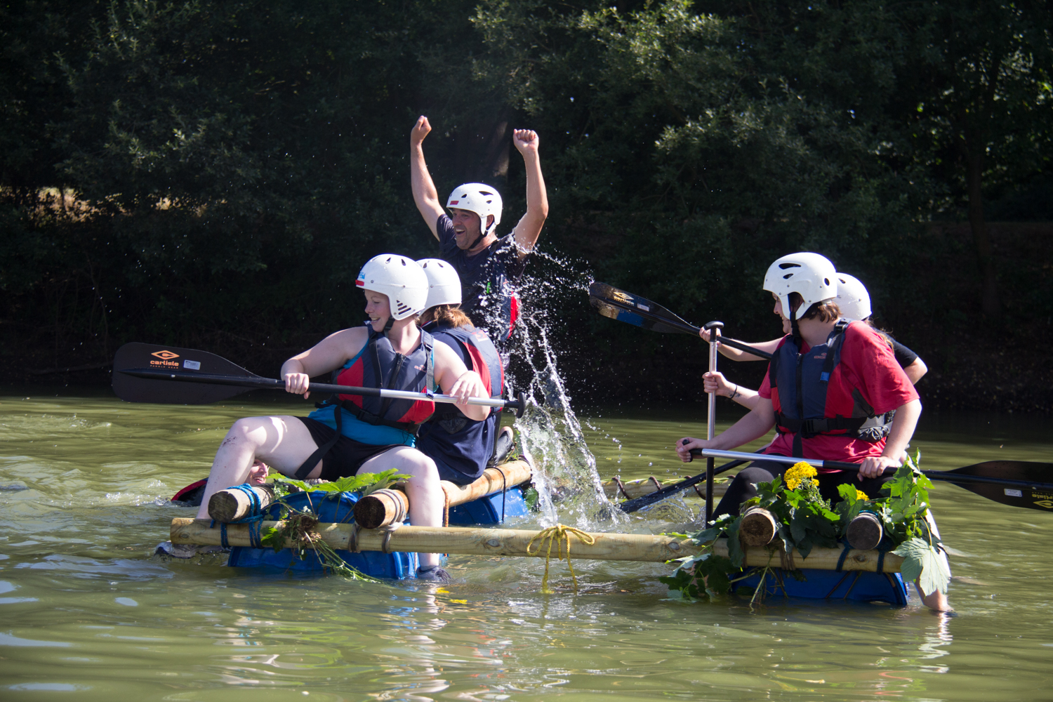 A group of women enjoying a raft building session