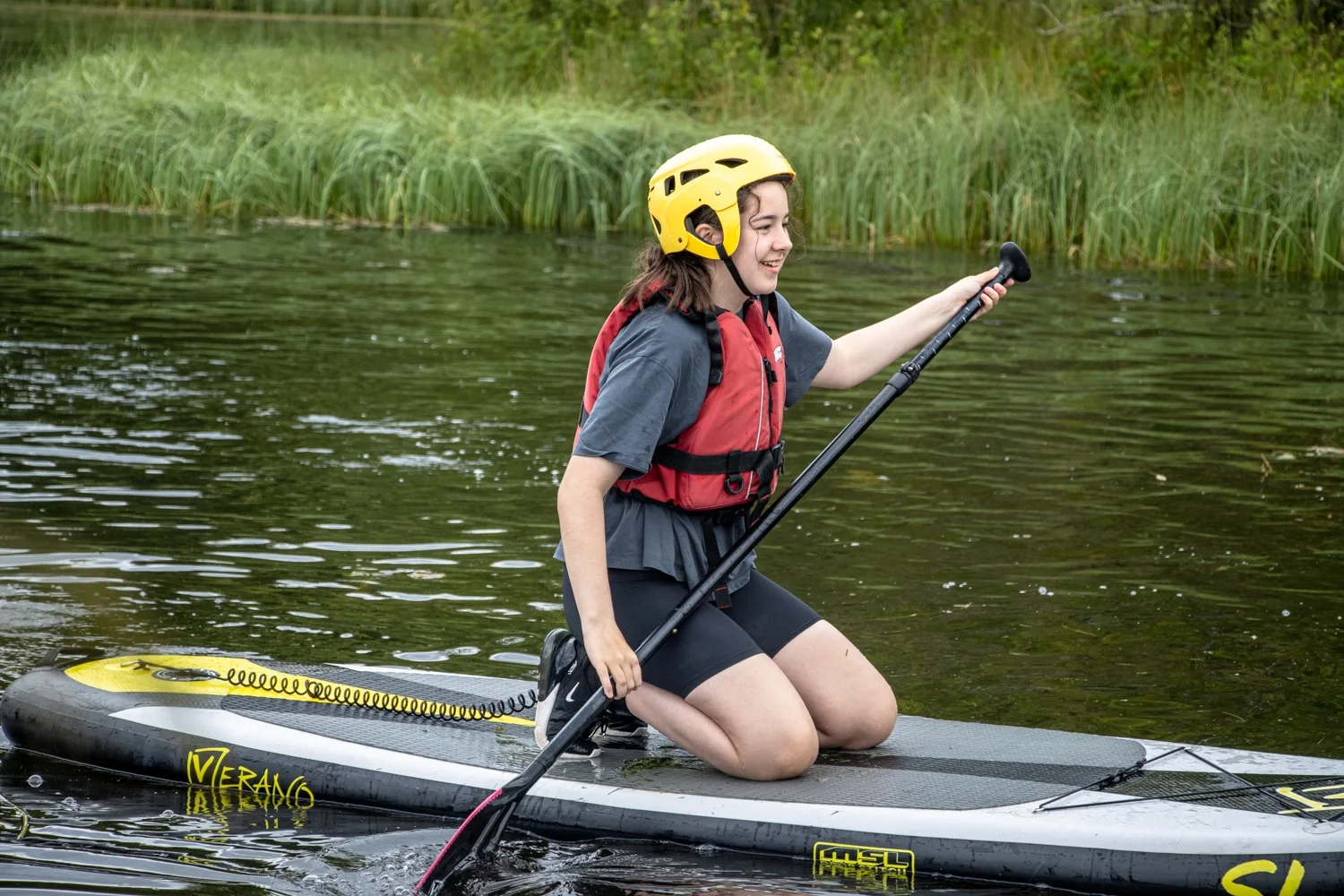 A girl taking part in a Family Paddling session with Cairngorms Activities