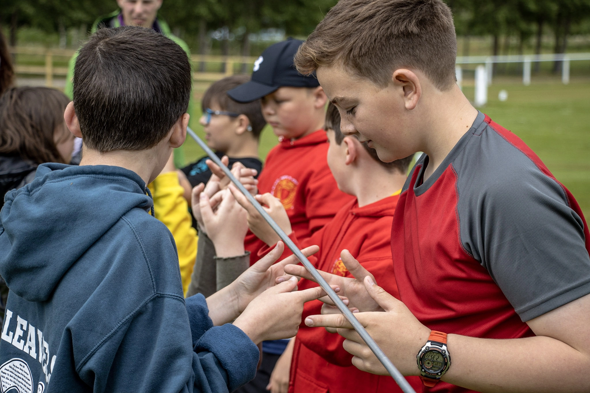 School group taking part in team challenge in Grantown-on-Spey