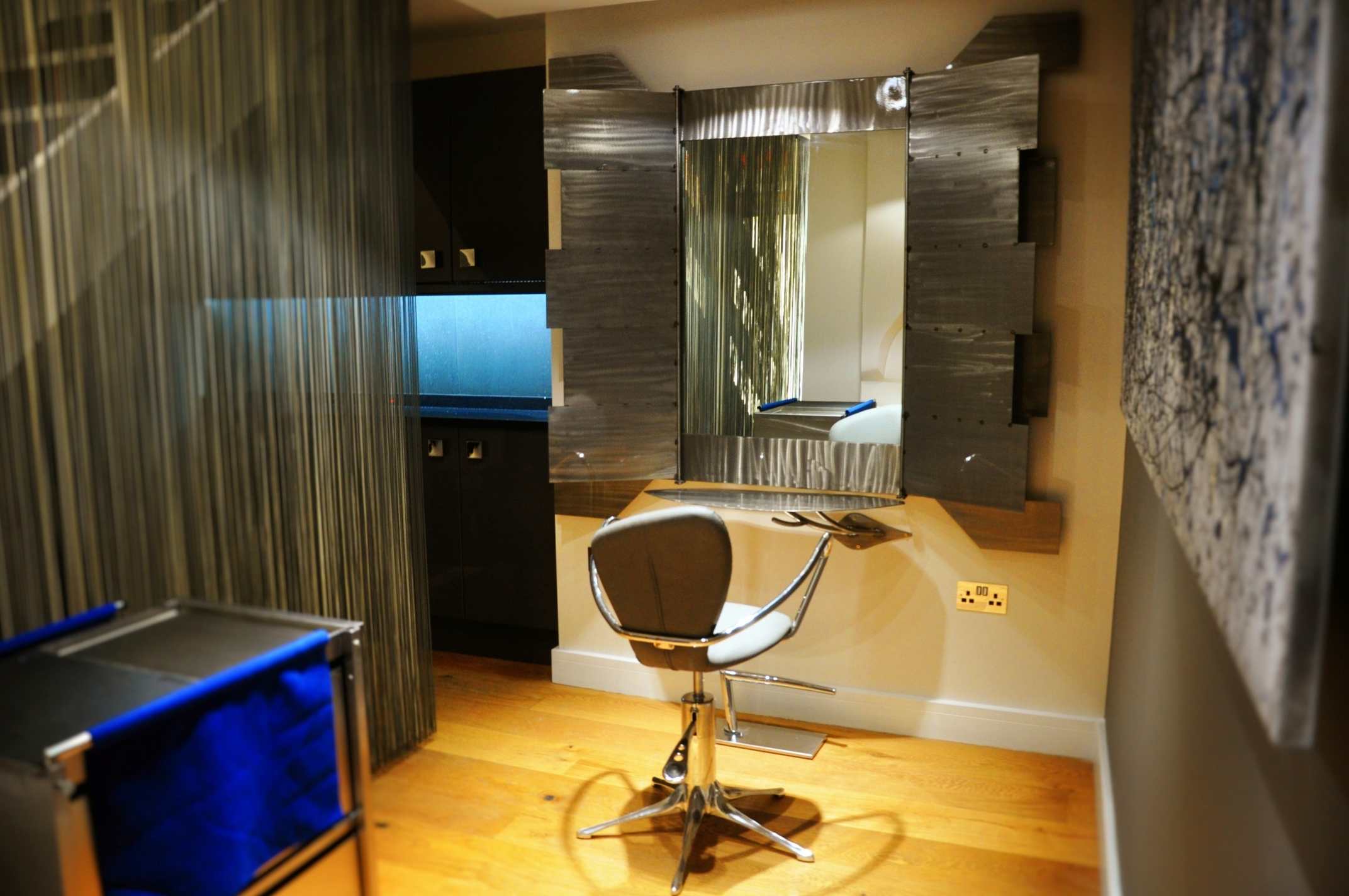 One-of-a-kind mirrors with optional cover-up panels at Mark Glenn's London Hair Extensions Studio