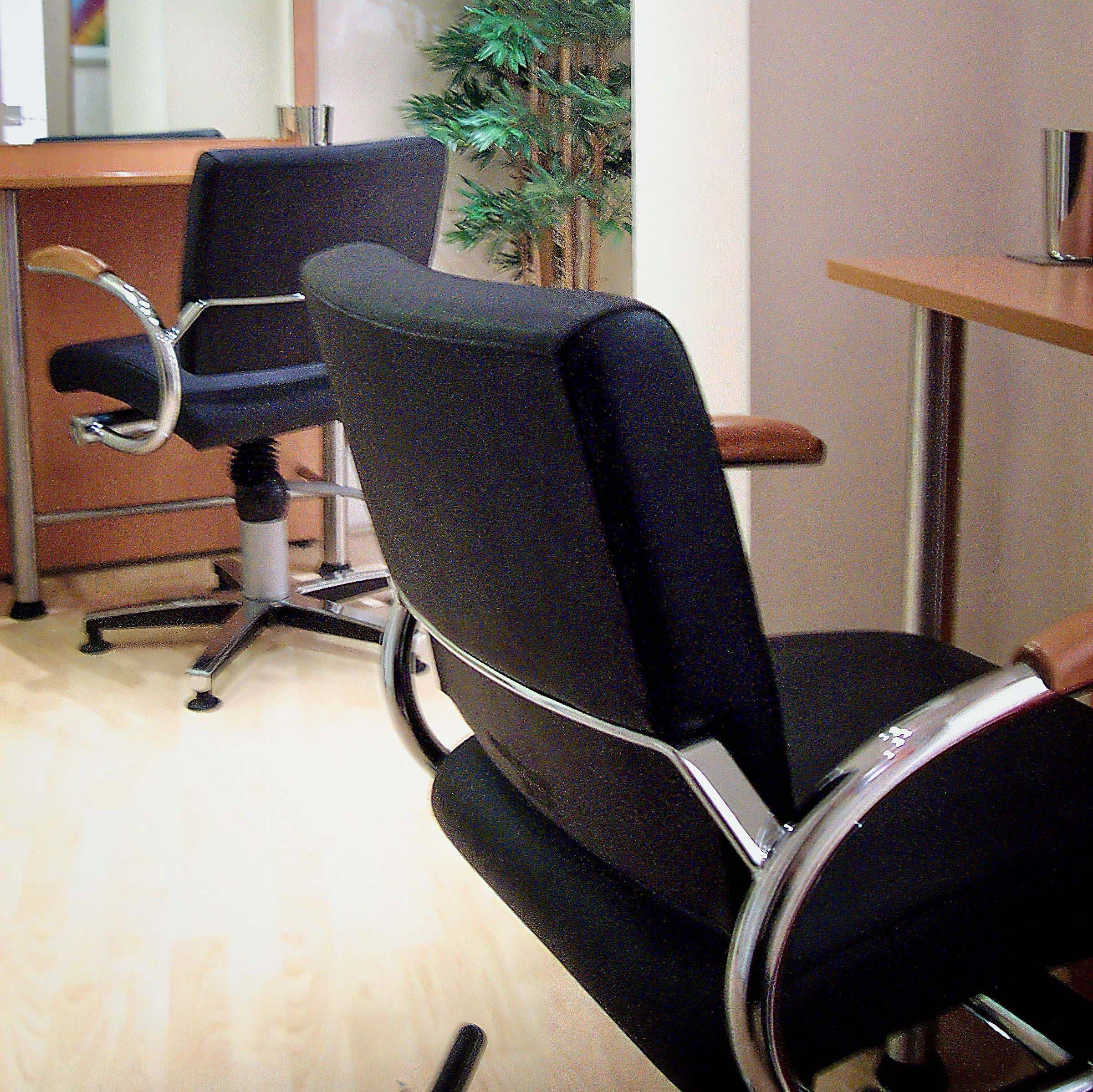 Styling chairs at Mark Glenn in London's New Bond Street, 2001