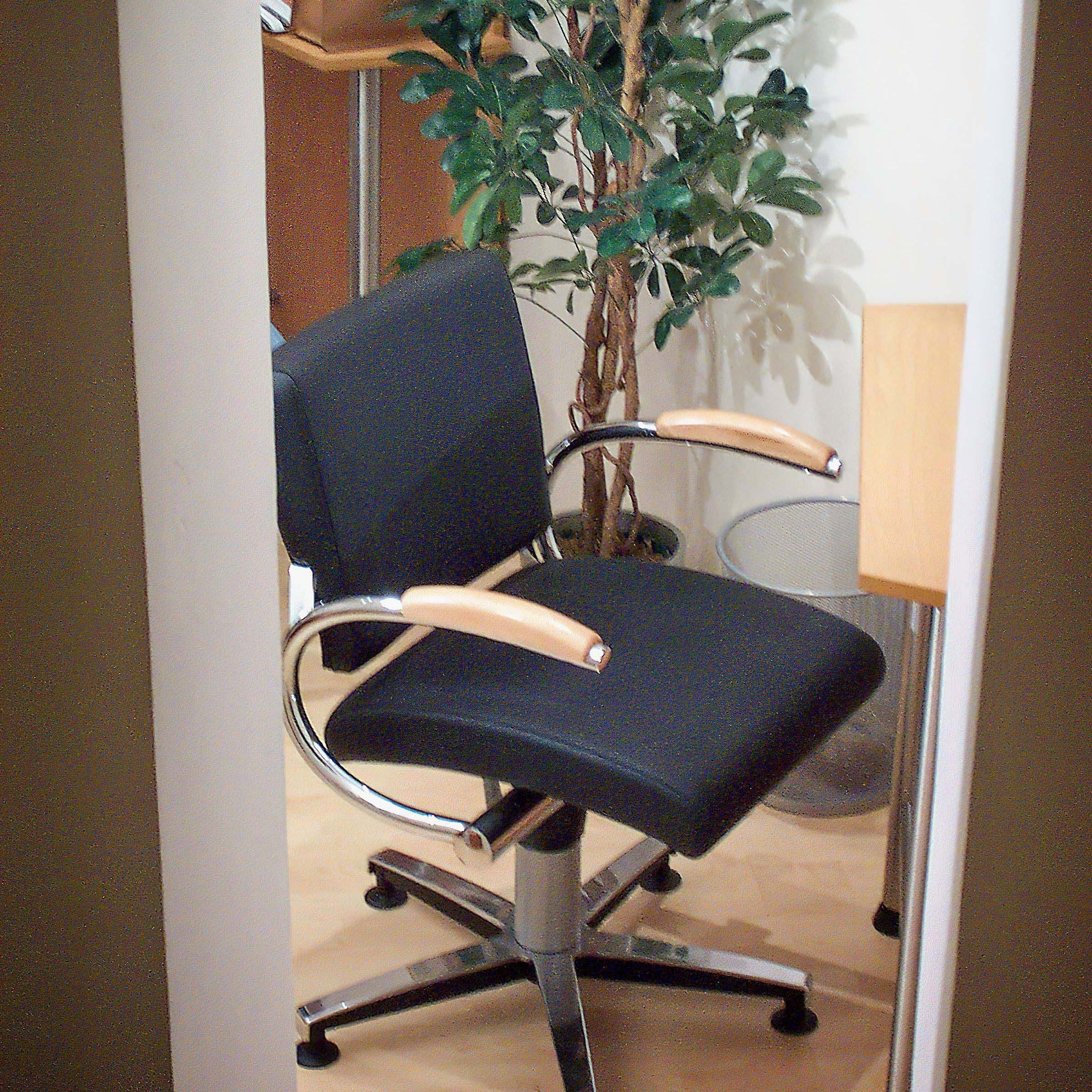 Styling chair at London's Mark Glenn Hair Enhancement, Mayfair 2001