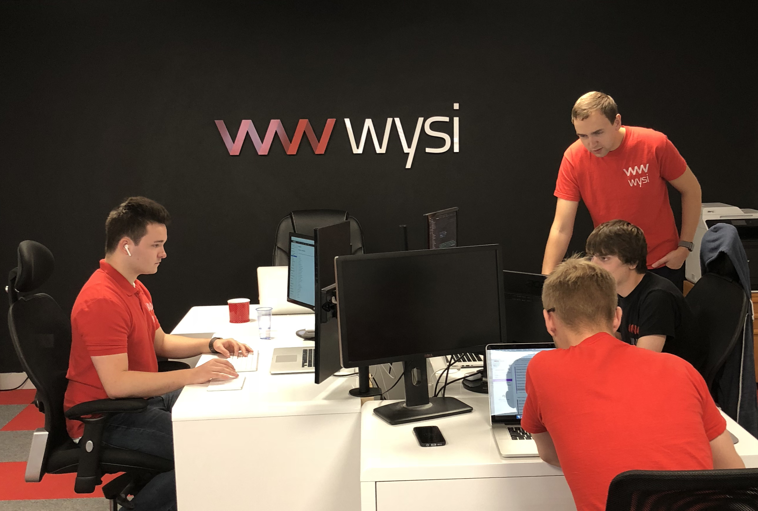 We're dedicated, passionate and we get the job done wysi hard at work