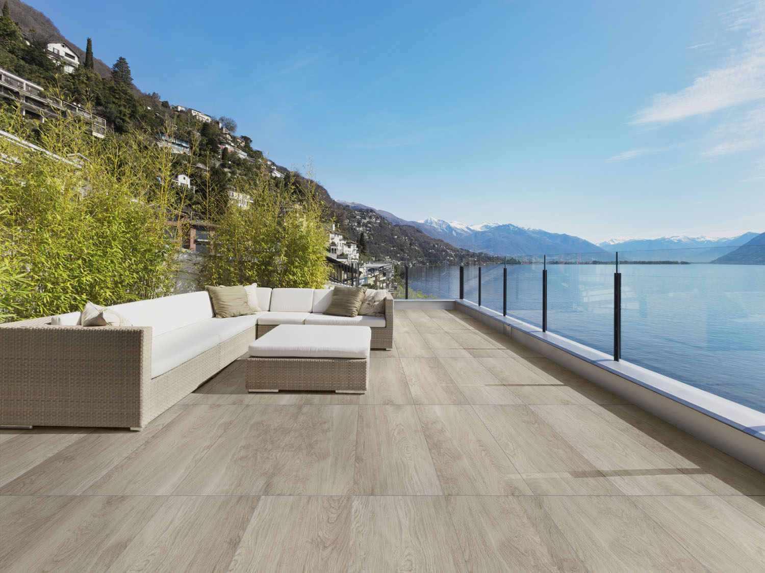 Bark Acacia paving laid with a glass a balcony overlooking the sea.