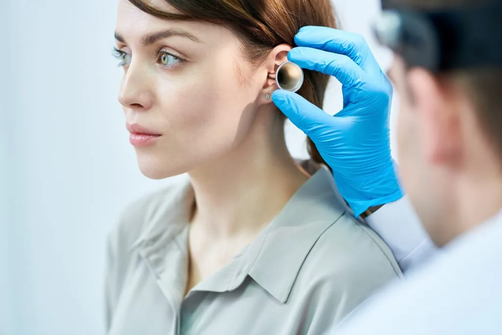 woman undergoing a hearing loss and balance treatment checkup in Sheffield