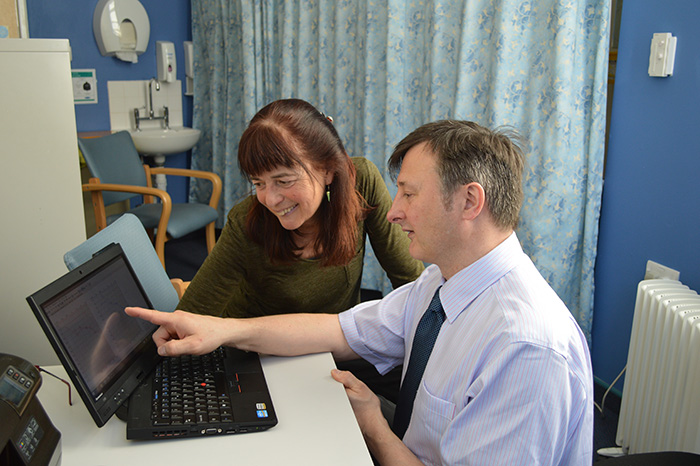 Person viewing a hearing test assessment in Sheffield